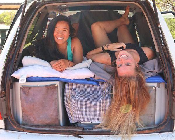 Campervan-travellers. Australian friends travelling together in a campervan