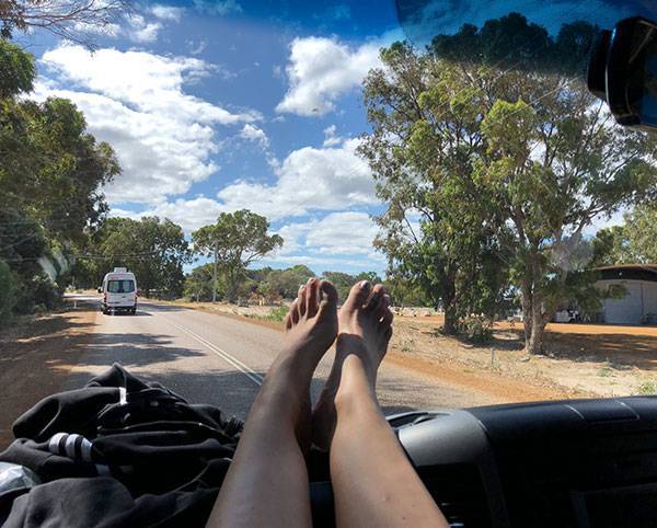 Feet-up-travel Feet up while travelling in a hire car